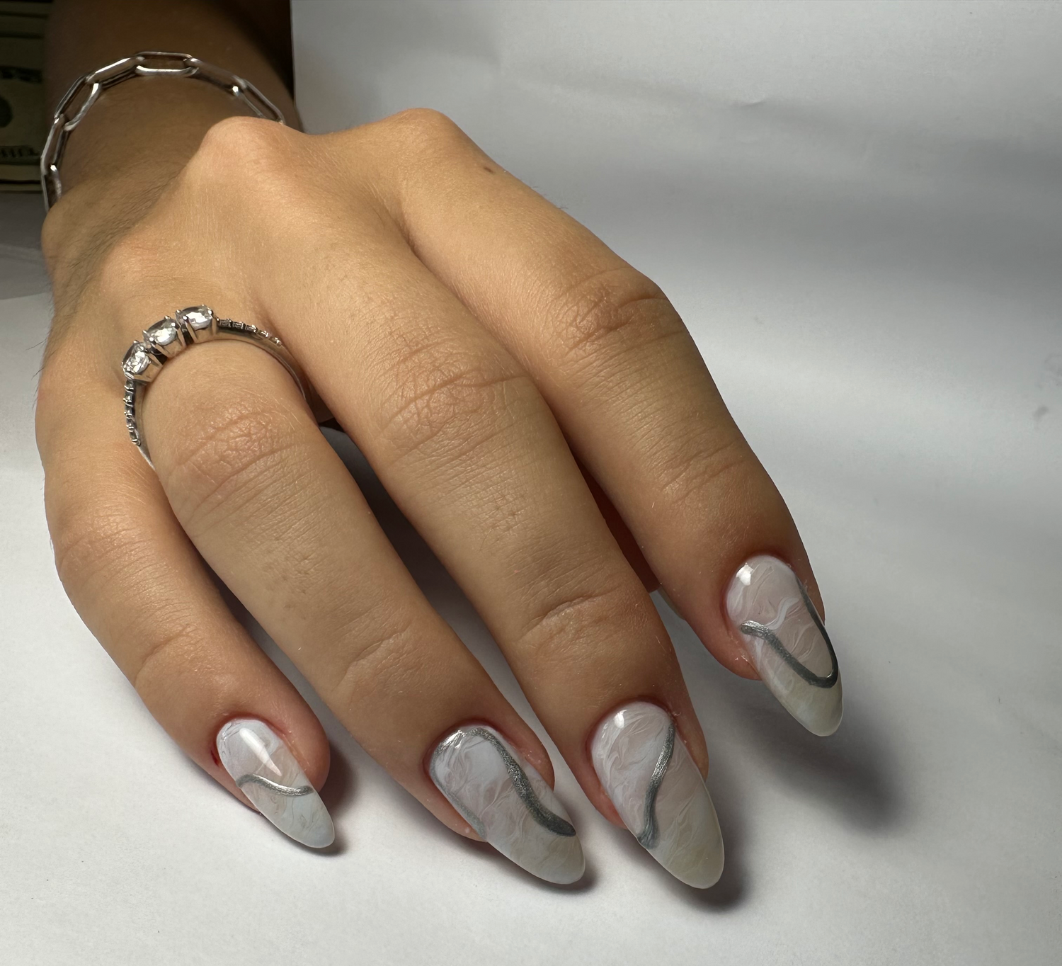 Almond Shaped Marbled Nails With Russian Manicure and Metallic Lines